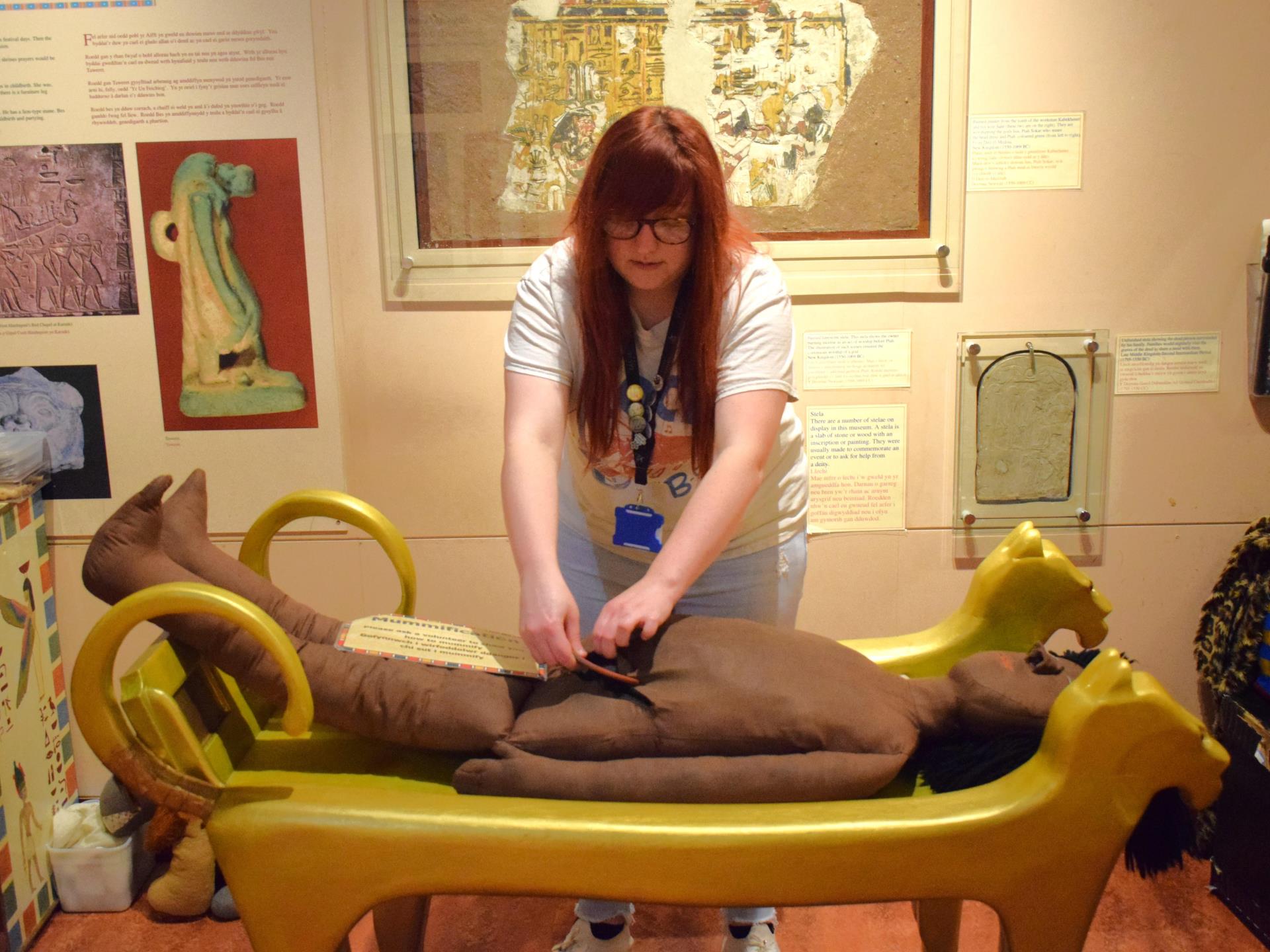 Volunteer performing Mummification